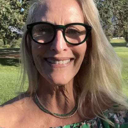 thick round green reading glasses 